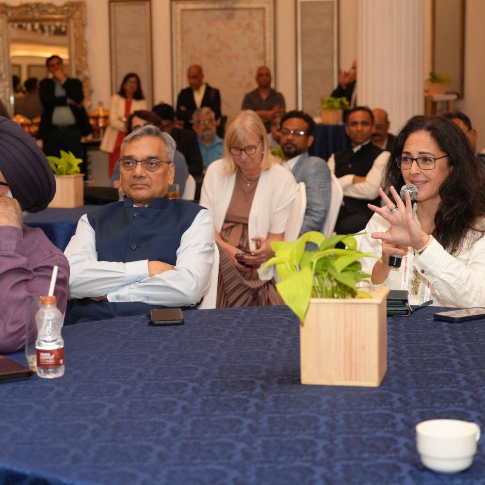 A speaker addressing guests at the New Delhi Leadership Exchange