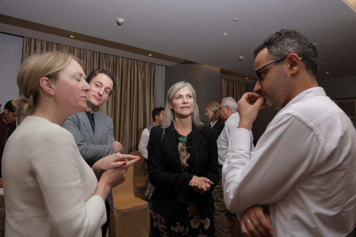 Guests greeting each other at the Gandhinagar Leadership Exchange